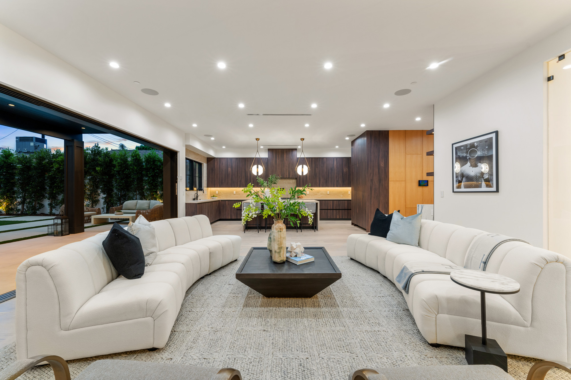 Studio City — open-plan continuity, kitchen to living