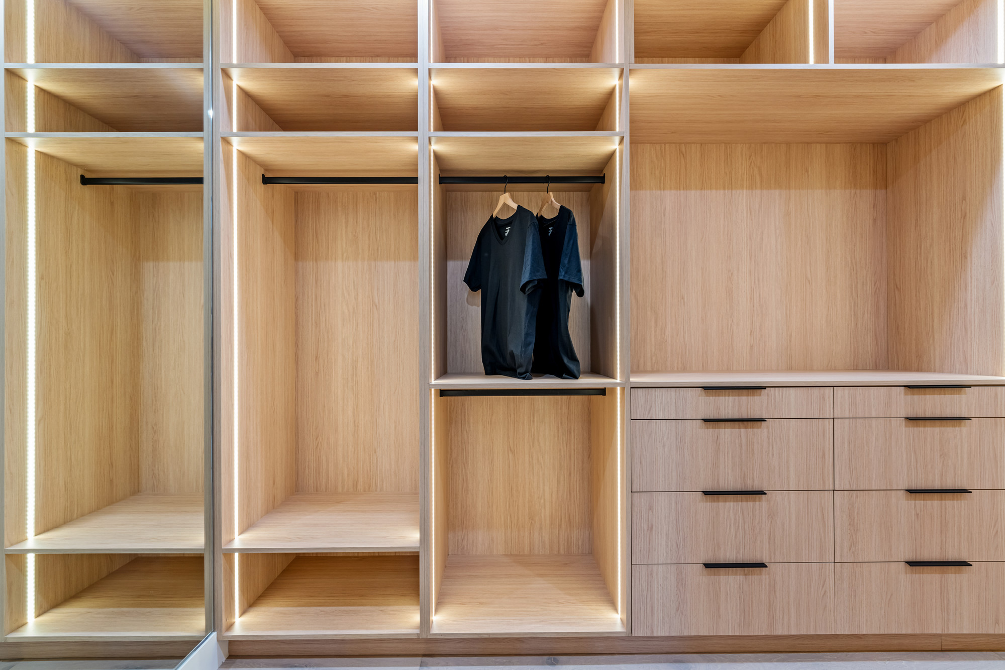 Full home cabinetry continuity, grain-matched wall-to-wall