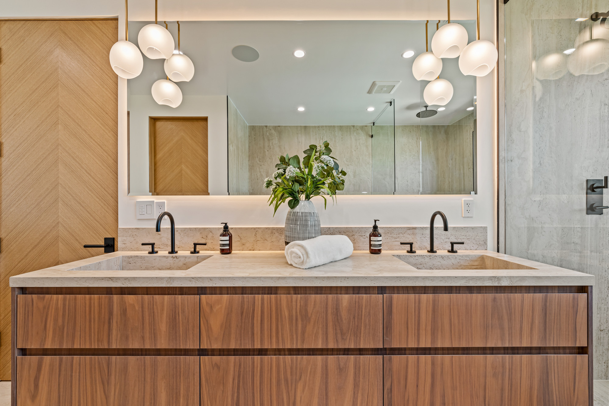 Home office cabinetry with floor-to-ceiling built-ins and hidden cable runs